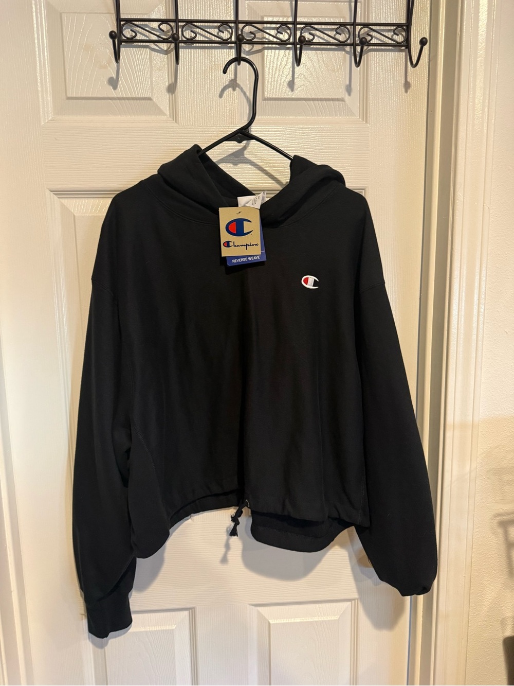 Champion Black Pullover Hoodie with Tag and Logo Accent